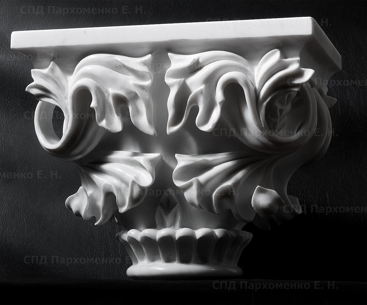 Фотография верхушки мраморной капители