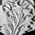 Лиственный орнамент из белого мрамора